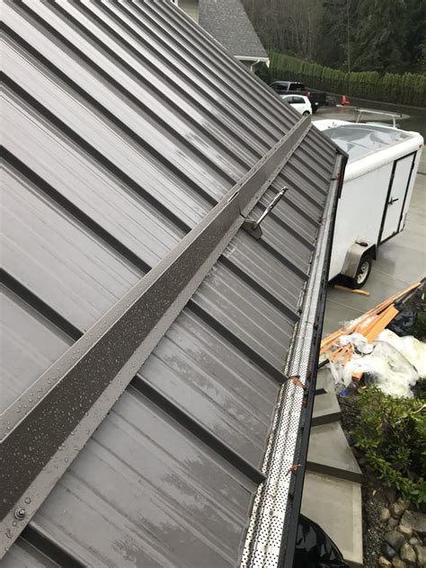 installing of metal ice guard roofing